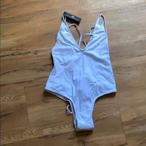 Brand new minimale animale one piece